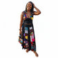 Woman wearing a colorful two piece patch outfit with a white background
