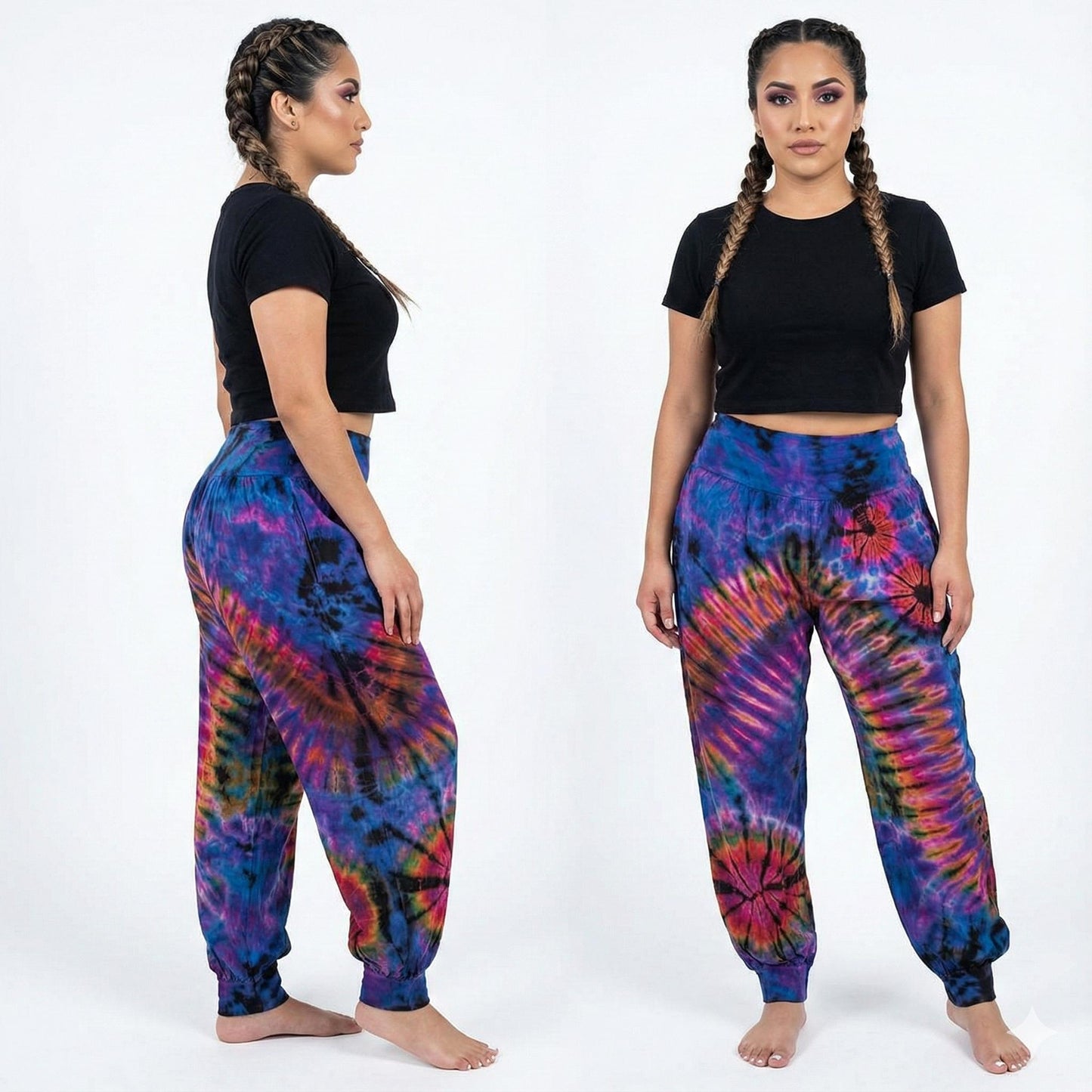 Woman wearing tie-dye joggers and a black crop top on a white background