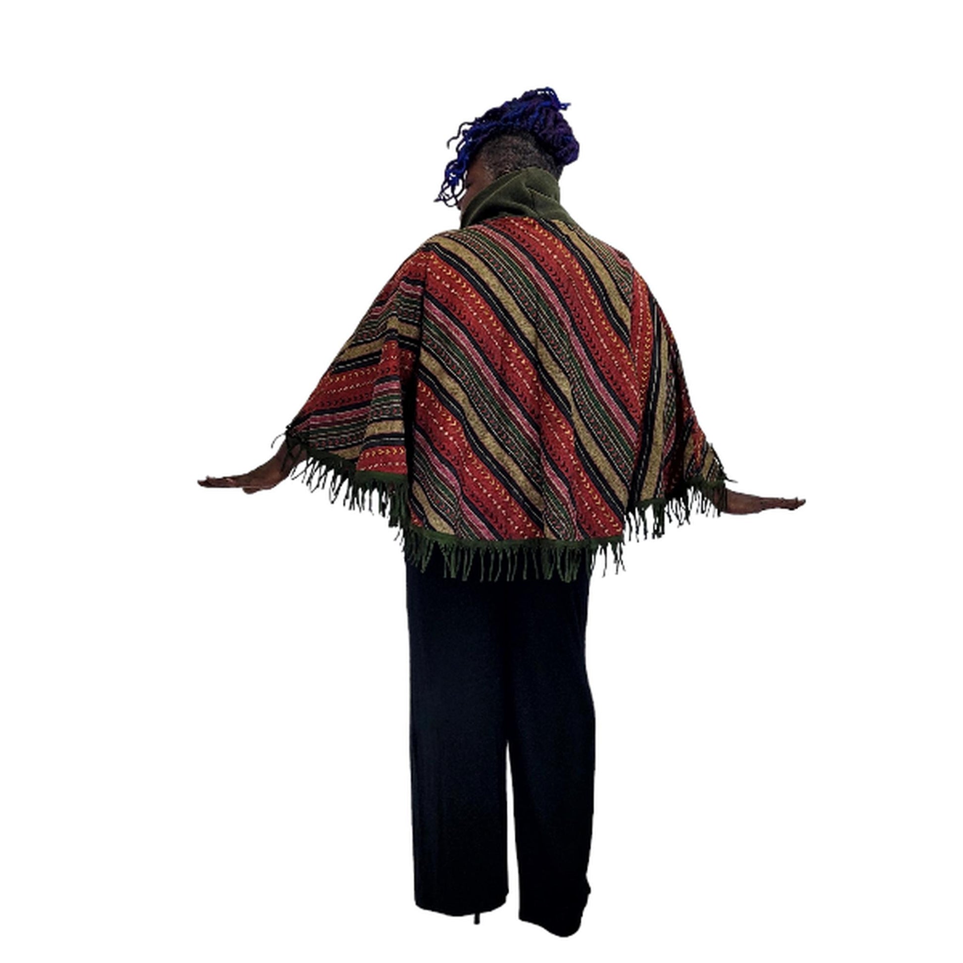 "Back view of fleece turtleneck poncho with fringe hem - handwoven winter outerwear"