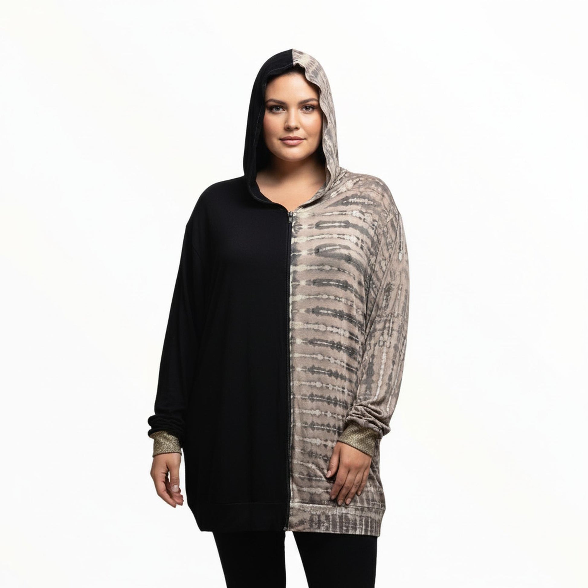 Two-tone hoodie with black and beige pattern on a white background