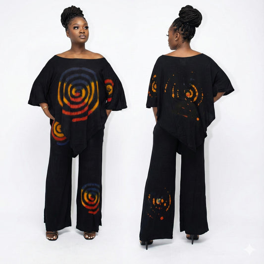 Woman wearing a black outfit with colorful spiral patterns on a white background  SanJules