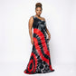 Woman wearing a tie-dye one-shoulder dress with red and black patterns on a white background SanJules
