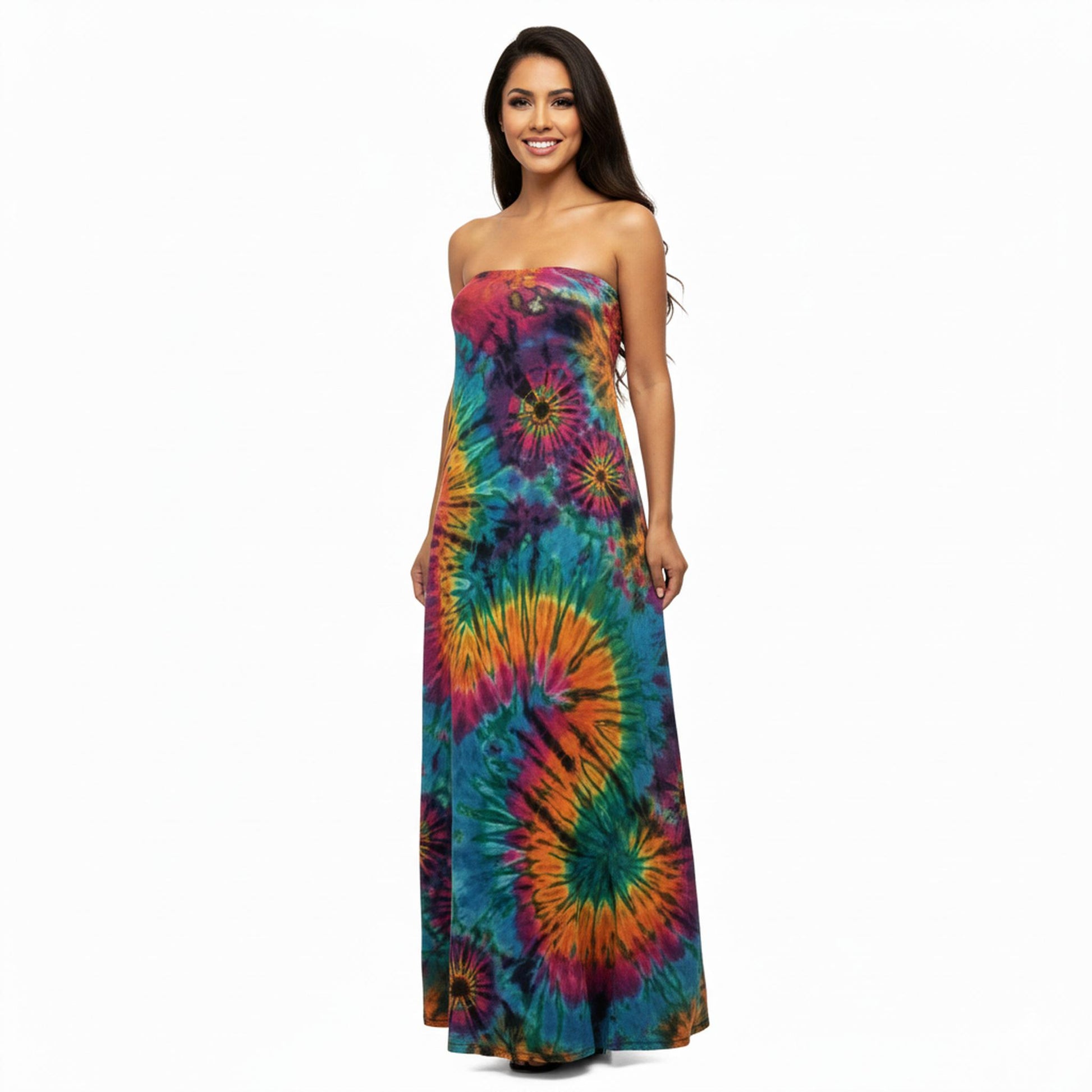 Woman wearing a colorful tie-dye strapless dress on a white background. SanJules