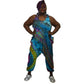 Person wearing a tie-dye jumpsuit on a white background SanJules