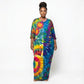 Woman wearing a colorful tie-dye dress on a white background SanJules