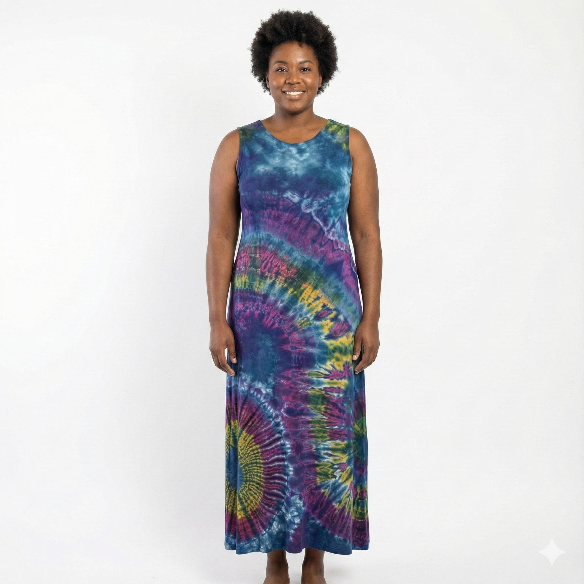 Woman wearing a tie-dye dress on a white background. SanJules