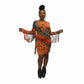 Woman wearing a tie-dye dress with fringe details on a white background. SanJules