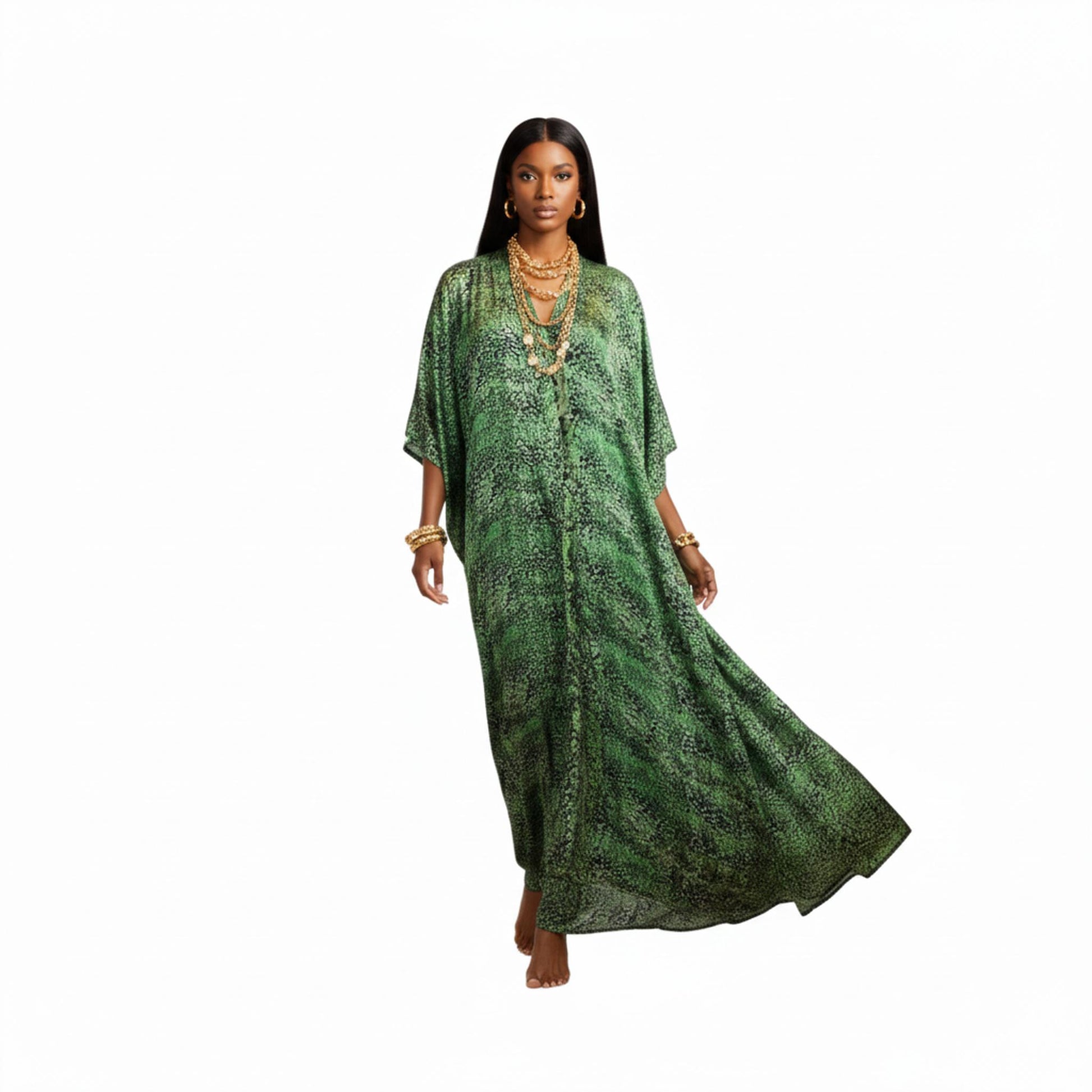Woman wearing a green patterned Kaftan on a white background