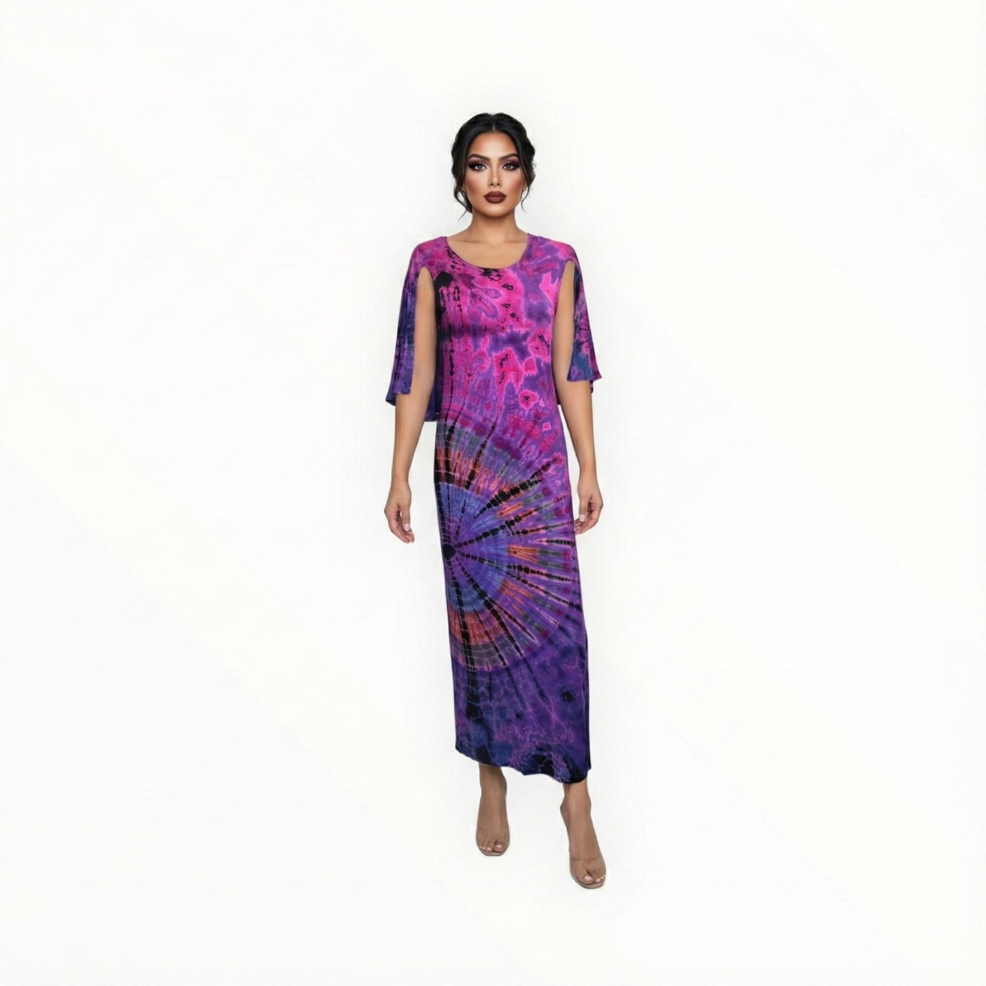 Woman wearing a purple and pink tie-dye dress on a white background