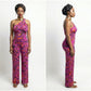 Woman wearing a pink floral jumpsuit from front and side views on a white background
