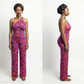 Woman wearing a pink floral jumpsuit from front and side views on a white background
