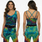 Woman wearing a colorful tie-dye spaghetti top with matching pants with a front and back view.