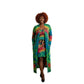 Woman in a colorful tie-dye duster over matching tie dye dress