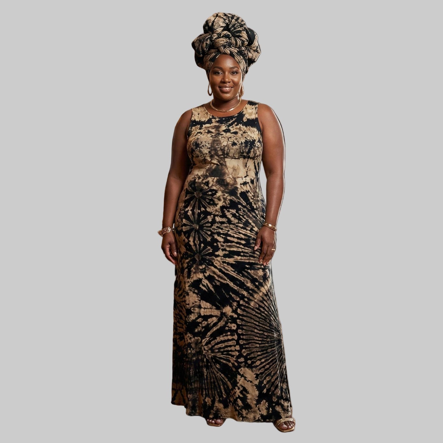 Woman in atie dye dress standing in an elegant room with wooden walls and a large mirror.