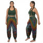 Woman wearing a green crop top and tie-dye joggers on a white background