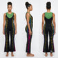 A woman modeling a black flared jumpsuit with vertical multicolor striped accents down the sides