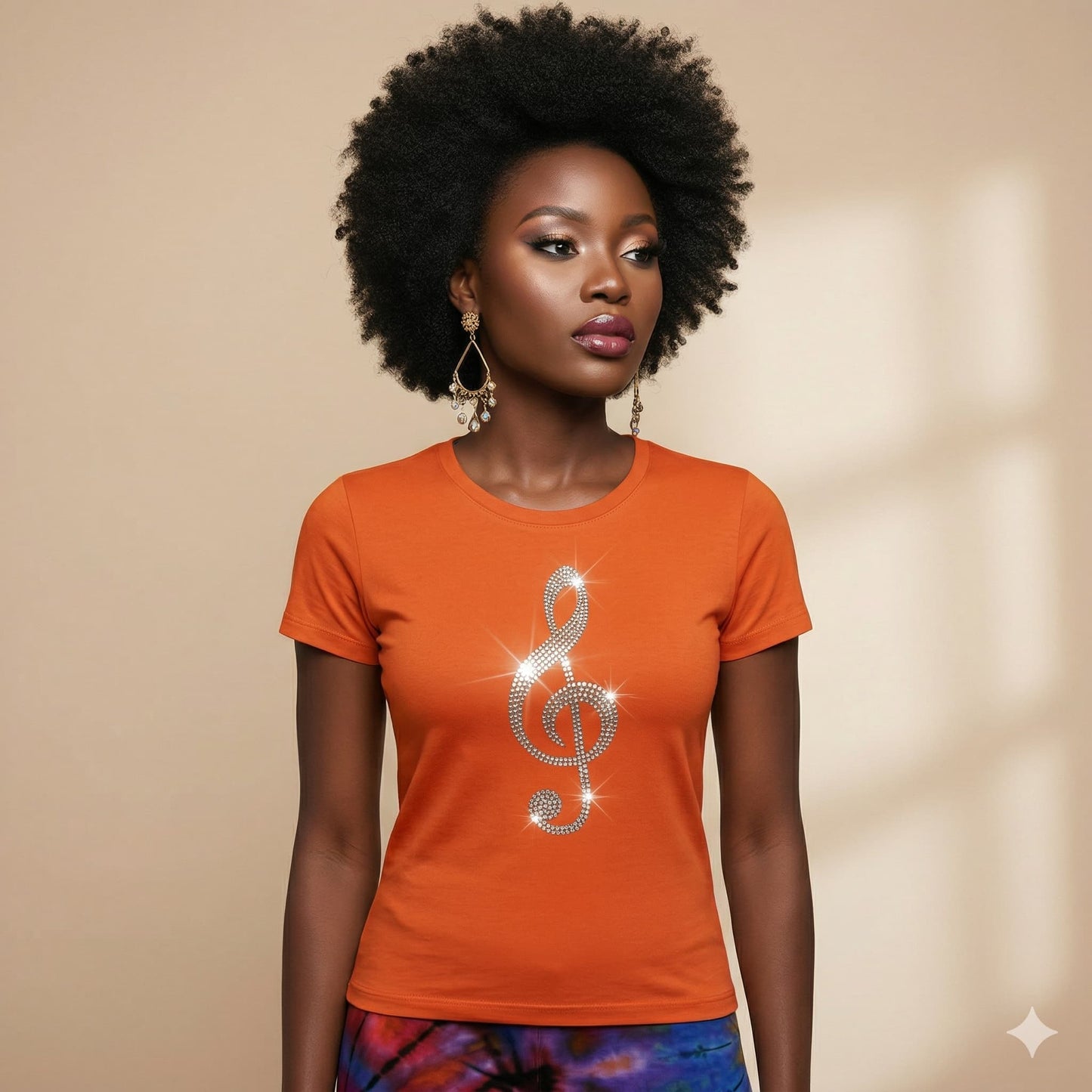 Woman wearing an orange t-shirt with a decorative clef symbol on a beige background