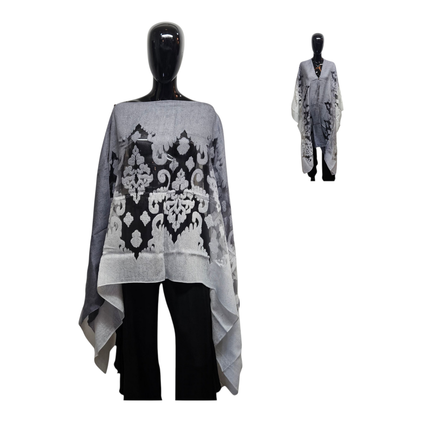 Gray and black patterned poncho on a mannequin against a white background