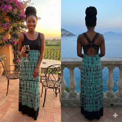 Woman in a green and black tie dye  dress with a scenic background