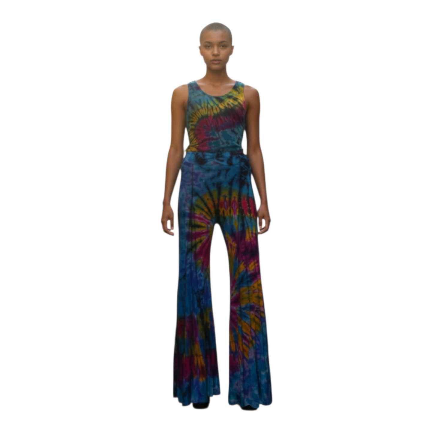Model wearing a tie-dye top and pants on a white background