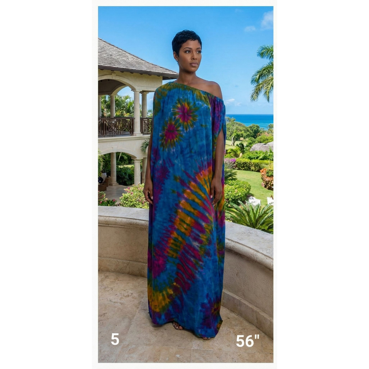 Woman wearing a colorful tie-dye dress with a scenic background