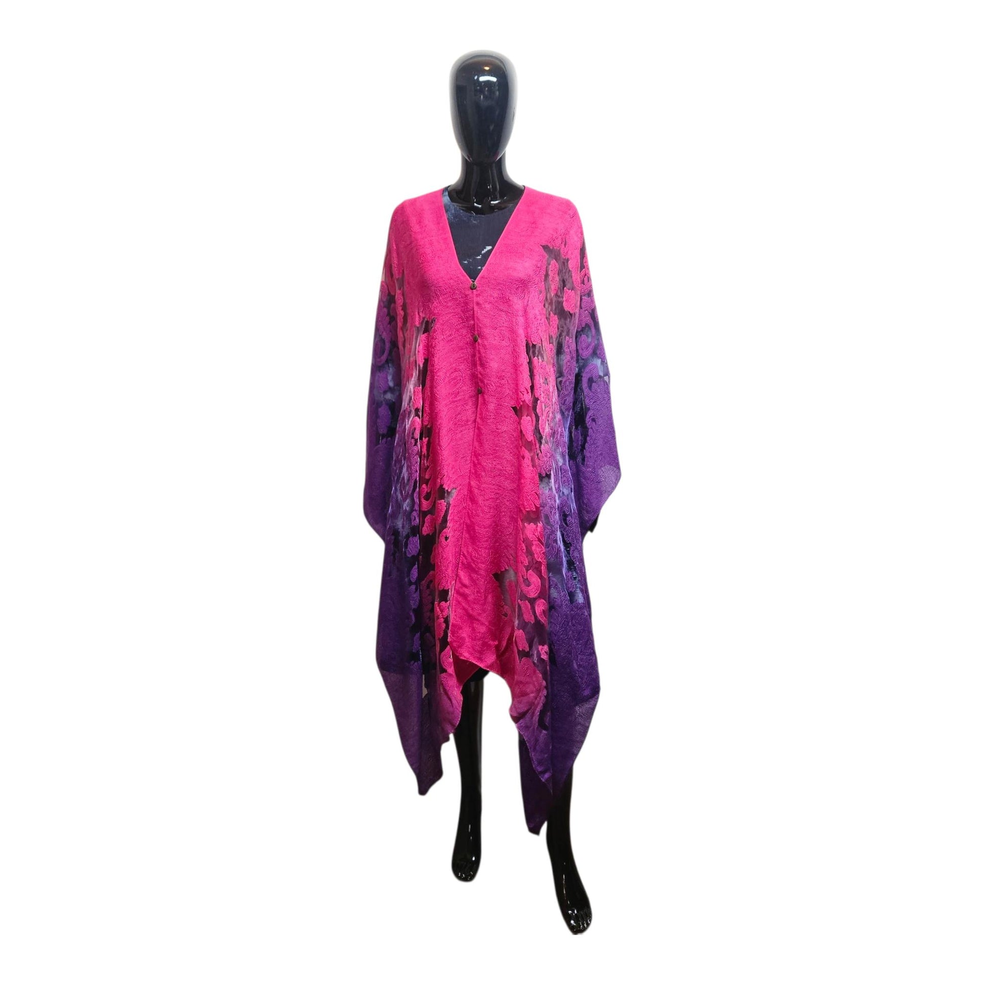 Mannequin wearing a pink and purple gradient dress on a white background