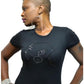 Black combed cotton t-shirt with a rhinestone bald head design, worn by a woman with hoop earrings.