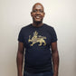 Man smiling in a black 100% cotton t-shirt with a gold lion wearing a crown graphic.