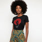 Black t-shirt with a red rhinestone afro woman design and silver necklace detail.